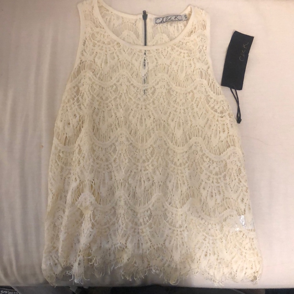 Cream, sleeveless top